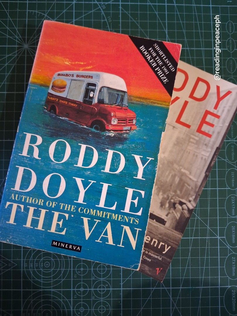 Roddy Doyle Books: The Van & A Star Called Henry (Category: Storybooks) located in Cavite. Submitted by readinginpeace (Listing ID 1444202327, Image 2). Description: - Two paperback novels by Roddy Doyle: 'The Van' and 'A Star Called Henry'. - 'The Van' was shortlisted for the Booker Prize. - 'A Star Called Henry' is praised for its Dublin setting and language. - Pages show some tanning and foxing due to age. - The spine of 'The Van' has some wea