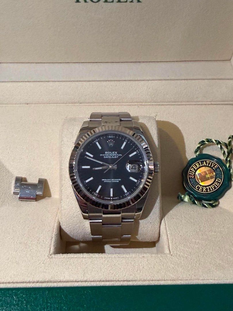 Rolex Datejust 41 Black Dial 126334 (Category: Luxury Watches) located in Makati City. Submitted by gcct888 (Listing ID 1444159331, Image 1). Description: Rolex Datejust 41 Black Dial White Gold Fluted Bezel and Oyster Bracelet Ref. 126334 2021 year model ✔️ 41mm Case ✔️ Automatic Rolex Caliber 3235 Movement ✔️ Black Stick Dial with Chromalight Markers ✔️ 18k White Gold Fluted Bezel ✔️ Sapphire Crystal ✔️ Oyster Bracelet with Easylink Extension ✔