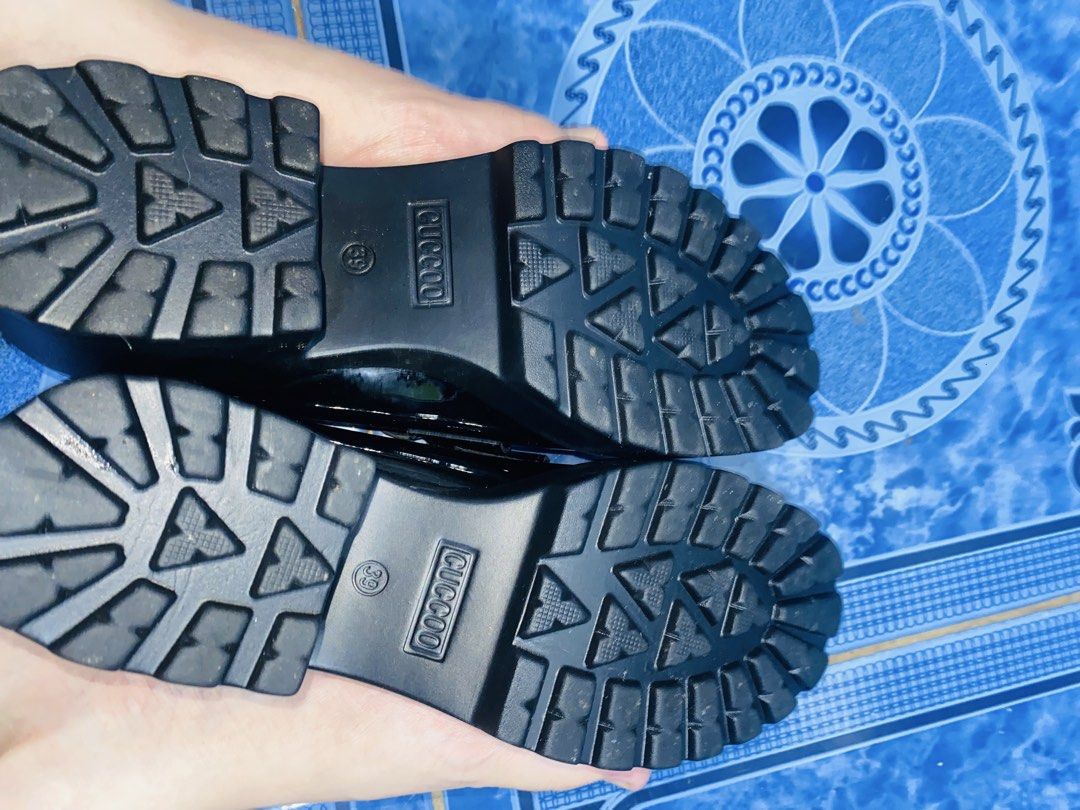 SHEIN Black Patent Chunky Platform Loafers (Category: Loafers) located in Manila. Submitted by swiftfish-afc9a7 (Listing ID 1444112897, Image 3). Description: - Black patent loafers - Chunky platform and heel - Gold buckle detail on the front - 'CUCOO' branded soles - Size 39 - Versatile for dressing up or down.