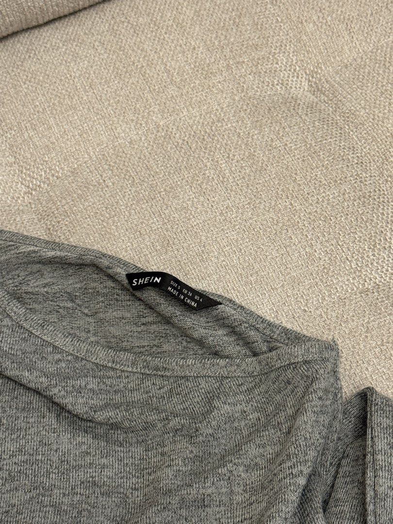 SHEIN One Shoulder Knot Front Dress (Category: Dresses) located in Manila. Submitted by calmgem24 (Listing ID 1444262035, Image 3). Description: - Gray one-shoulder dress - Size: SMALL - knot front detail - soft, stretchy material - originally bought for 500 Php - FREE: 2pcs hanger.