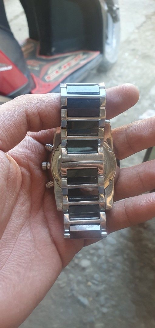 Spectra Chronograph Watch (Category: Men's Watches) located in Zamboanga. Submitted by sarahjaneatari (Listing ID 1444150175, Image 2). Description: - Spectra Chronograph Watch - White dial with Arabic numerals - Stainless steel and black band - Functional chronograph subdials - Metal bracelet - Stylish and versatile for everyday or special occasions.