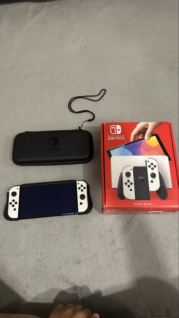 Switch Oled Fullset (Category: Nintendo) located in Bangi. Submitted by farisalimipp (Listing ID 1444279349, Image 1). Description: Switch oled fullset, tambah 50 saya bagi satu game.