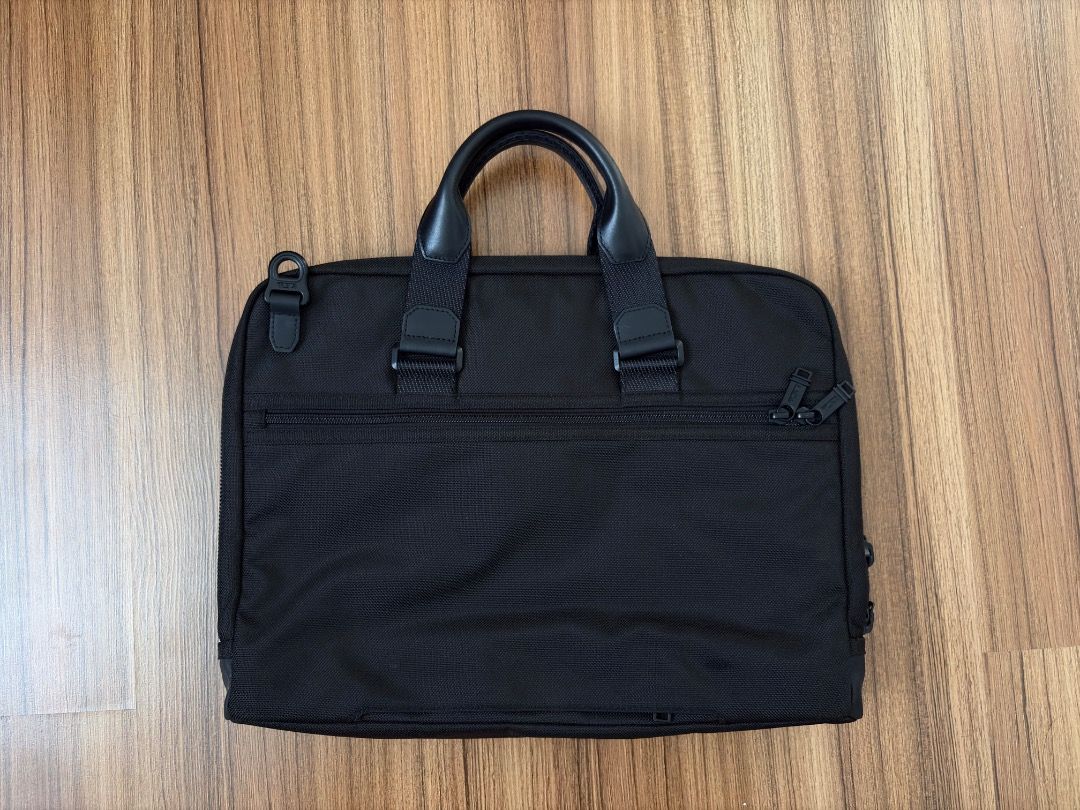 Tumi Academy Brief/Laptop Bag (Category: Briefcases) located in Caloocan City. Submitted by jacobkimbe52560 (Listing ID 1444152600, Image 2). Description: - Almost New Black Tumi Briefcase - Crafted from durable ballistic nylon - Features premium leather handles and trim - Multiple compartments for superior organization - Includes original luggage tag - Ideal for both professional work and travel needs RFS: Need funds. Condition: Still brand new 