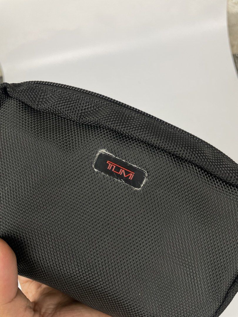 Tumi for Delta Black Nylon Travel Pouch (Category: Luxury Bags & Wallets) located in Manila. Submitted by rdtp2 (Listing ID 1444292959, Image 2). Description: - Black Tumi Pouch - Delta Collaboration - Durable Nylon Material - Zipper Closure - Ideal for Travel Essentials or Toiletries - Compact Size - Clean Interior.