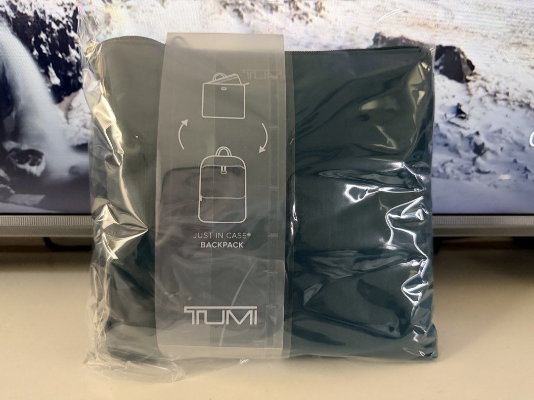 TUMI "Just In Case" Packable Backpack (Category: Backpacks) located in Las Pinas. Submitted by elenakrizzia (Listing ID 1442915833, Image 2). Description: TUMI 'Just In Case' Packable Backpack Color: Lagoon with Silver hardware Brandnew, Never been used. Gift. Bought in LA. Reason for selling: Not my color. PH Price 11k+.