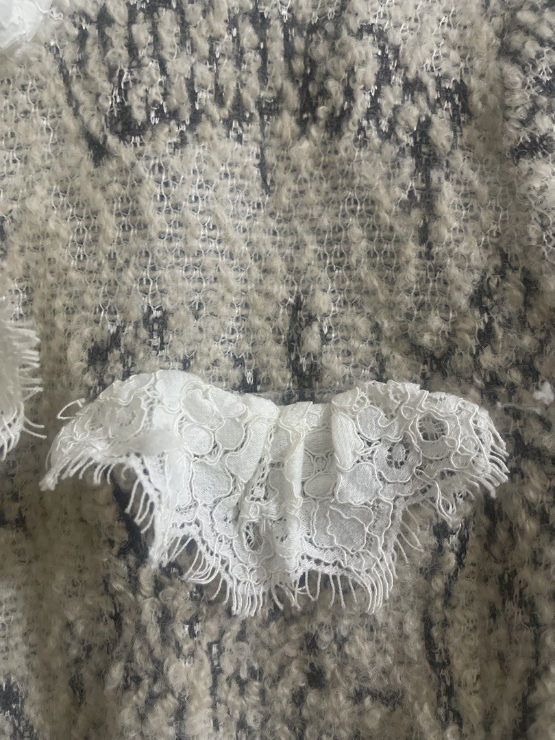 Tweed Jacket with Lace Trim and Ruffles (Category: Coats, Jackets and Outerwear) located in Manila. Submitted by mzclm (Listing ID 1444140850, Image 2). Description: - Elegant cream and black tweed jacket - Features delicate white lace trim and ruffles - Lace detailing along the front opening and pockets - Chic gold button closure - Adds a touch of sophistication to any outfit.