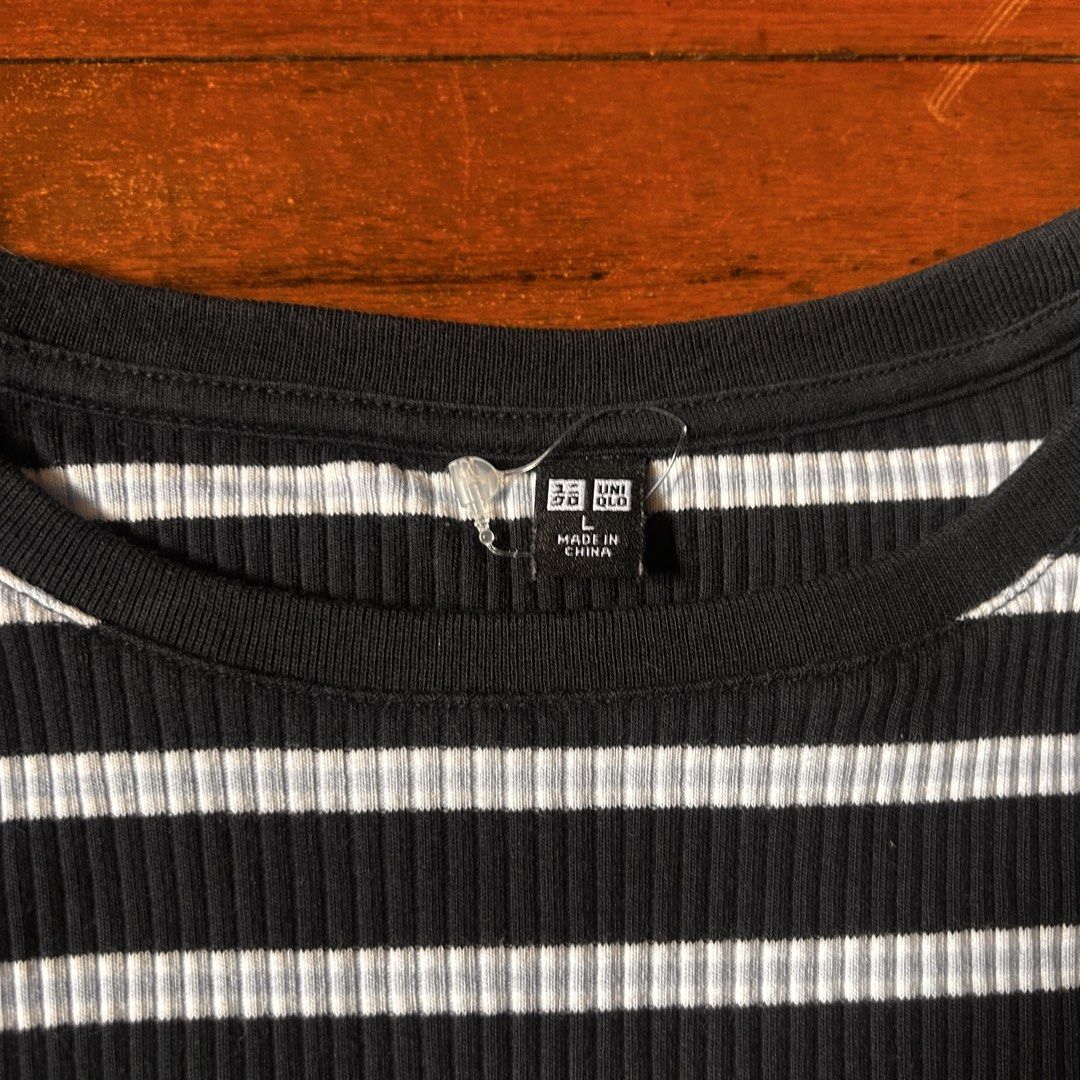 Uniqlo stripped ribbed crop top (Category: Shirts) located in Marikina City. Submitted by talugh (Listing ID 1439935223, Image 3). Description: size large used 1-2 only color black while and light blue tags : baby tee, fitted top, ribbed top, basic top, cropped top, stretch top, cotton top, casual top, everyday top, white top, black top, brown top, minimalist, clean girl aesthetic, pinterest outfit, pinterest fashion, brandy melville inspired, br