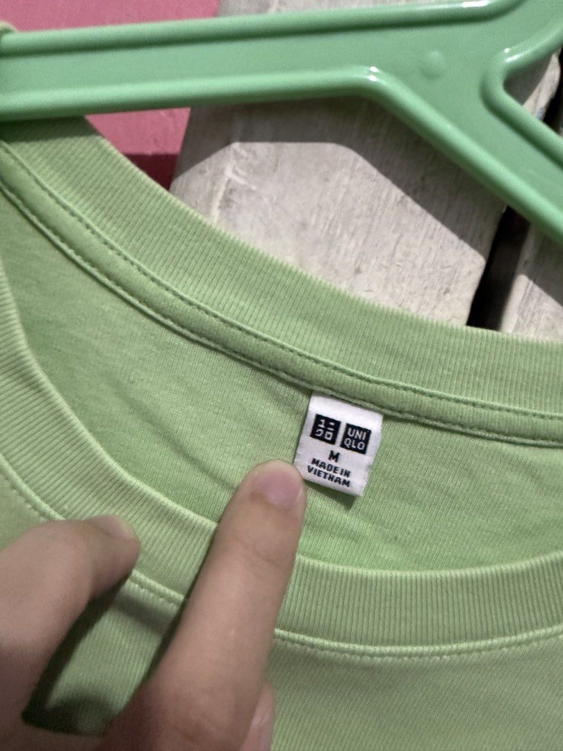 Uniqlo T-shirt (Category: Blouses) located in Manila. Submitted by prelovedbyshai_116 (Listing ID 1444225611, Image 2). Description: - Uniqlo Basic T-Shirt - Color: Light Green - Style: Crew Neck, Short Sleeves - Origin: Made in Vietnam - Perfect for everyday wear - Versatile and easy to pair with any outfit - Please check photos for detailed condition -Medium.