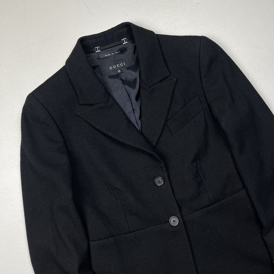 Vintage Gucci Early 2000s Seamed Wool Blazer (Category: Luxury Apparel) located in Quezon City. Submitted by forgarments (Listing ID 1444121981, Image 2). Description: Vintage Gucci Early 2000s Seamed Wool Blazer Excellent Condition Size: 38 Shoulder: 15 Inches Chest width: 16.5 Inches Waist: 14.5 Inches Sleeve: 25.5 Inches Length: 27 Inches This tailored black wool blazer from the early 2000s is a classic example of Gucci’s sleek aesthetic durin