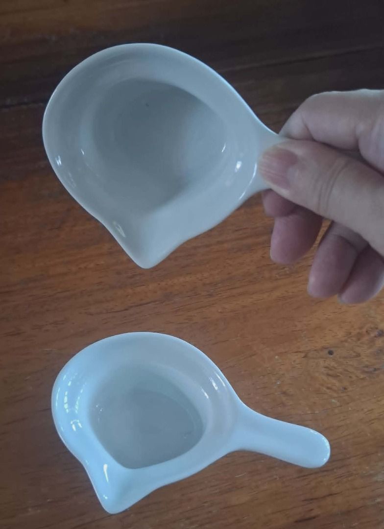 White Ceramic Spoon Rest / Condiment Dish Set (2 pcs) (Category: Cookware & Accessories) located in Quezon City. Submitted by m_decluttering_sale (Listing ID 1444160765, Image 1). Description: White Ceramic Spoon Rest / Condiment Dish Set (2 pcs) 💯 Pre-owned, Like New Elegant white ceramic dishes in excellent condition. Can be used as spoon rests, condiment dishes, dipping sauce bowls, or for serving small portions of spices and seasonings. Clea