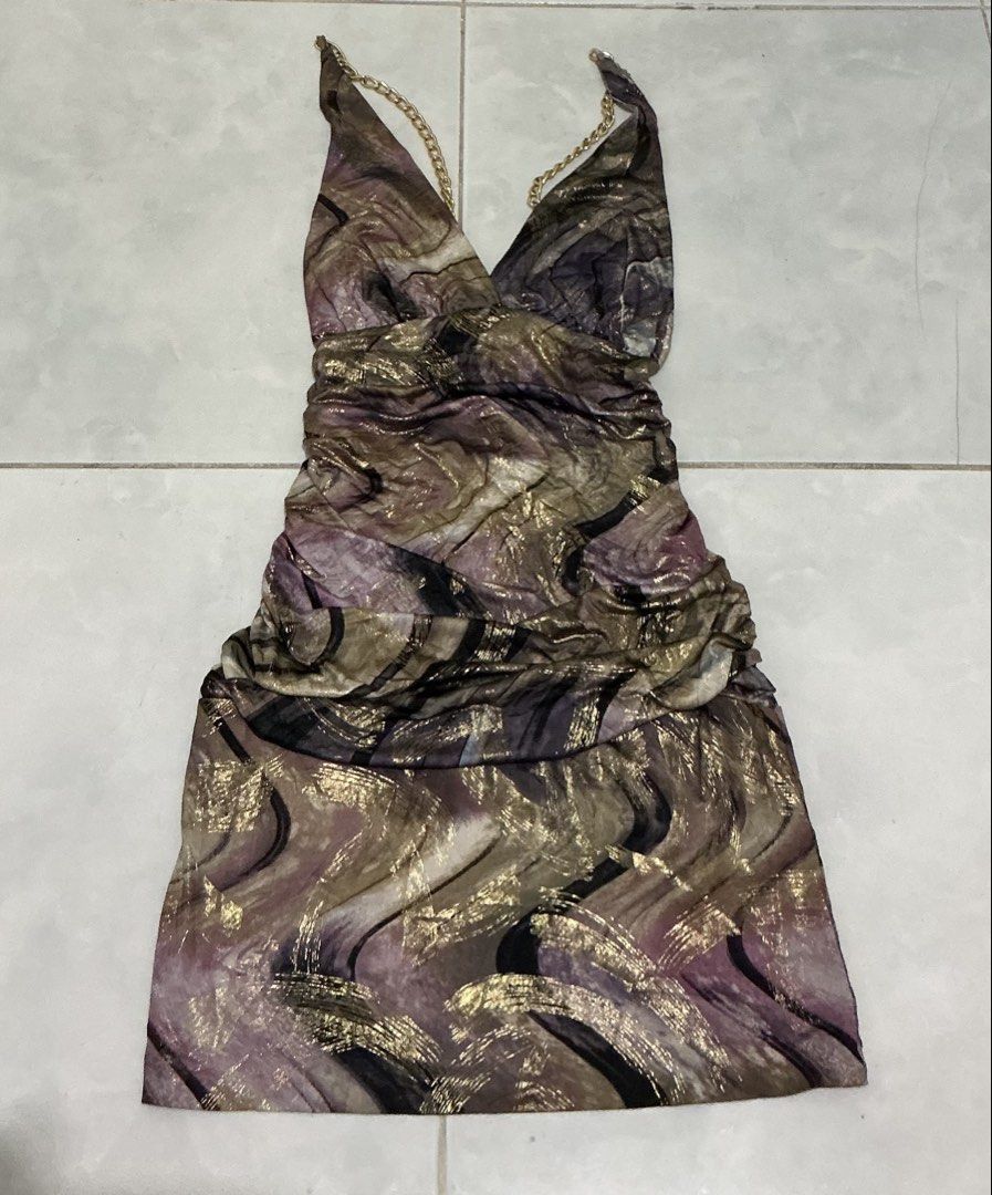 SOLD y2k 00s vintage Primadonna Ruched Chain Strap Mini Dress (Category: Dresses) located in Naga. Submitted by vint.finds (Listing ID 1444273486, Image 2). Description: - Funky mini dress with a unique marble-like print - Features stylish gold chain straps - Flattering ruched detailing on the sides - Fabric has a subtle shimmer for added glam - Ideal for a night out or party - Designed for a snug, figure-hugging fit .