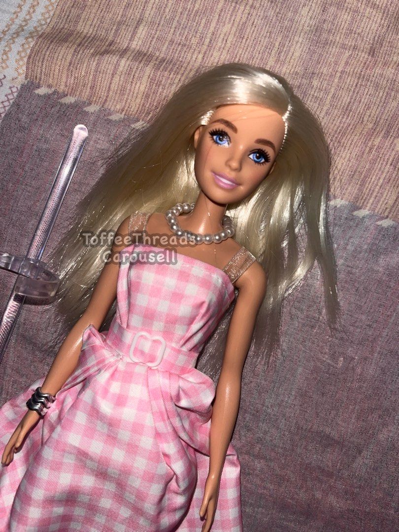 2013 Single Original Barbie Doll | Mattel (Category: Kids Toys) located in Manila. Submitted by toffeethreads (Listing ID 1444470190, Image 2). Description: INCLUSION: -Doll, clothes, accessories, and acrylic doll stand. FLAWS: -Does not include original clothes and shoes, the ones she's wearing now are d00plicakes bought from the orange app. -Does not include original packaging so expect minor flaws like dust and scratches, WYSIWYG -No other maj