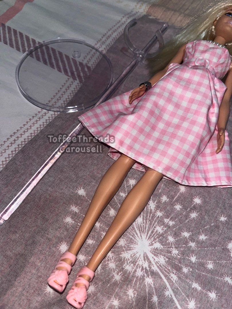 2013 Single Original Barbie Doll | Mattel (Category: Kids Toys) located in Manila. Submitted by toffeethreads (Listing ID 1444470190, Image 3). Description: INCLUSION: -Doll, clothes, accessories, and acrylic doll stand. FLAWS: -Does not include original clothes and shoes, the ones she's wearing now are d00plicakes bought from the orange app. -Does not include original packaging so expect minor flaws like dust and scratches, WYSIWYG -No other maj