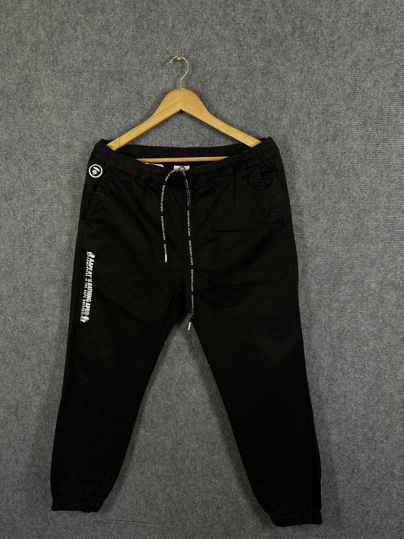 A Bathing ape (Category: Joggers) located in Daet. Submitted by kevsquintela (Listing ID 1444358680, Image 1). Description: A Bathing Ape Woven 🖤🤍🖤 Size - 32 - 35 Length - 37 Excellent CR 9.7 .