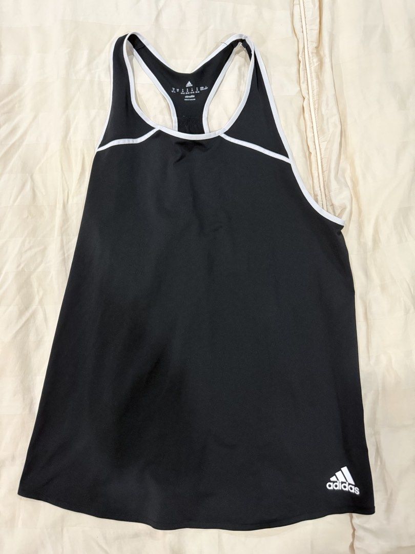 Adidas Climalite Black Tank Top (Category: Activewear) located in Quezon City. Submitted by jiafoo (Listing ID 1444496357, Image 1). Description: - Black Adidas tank top - Racerback style with white trim - Climalite fabric for breathability - Ideal for workouts or casual wear - Size: Medium.
