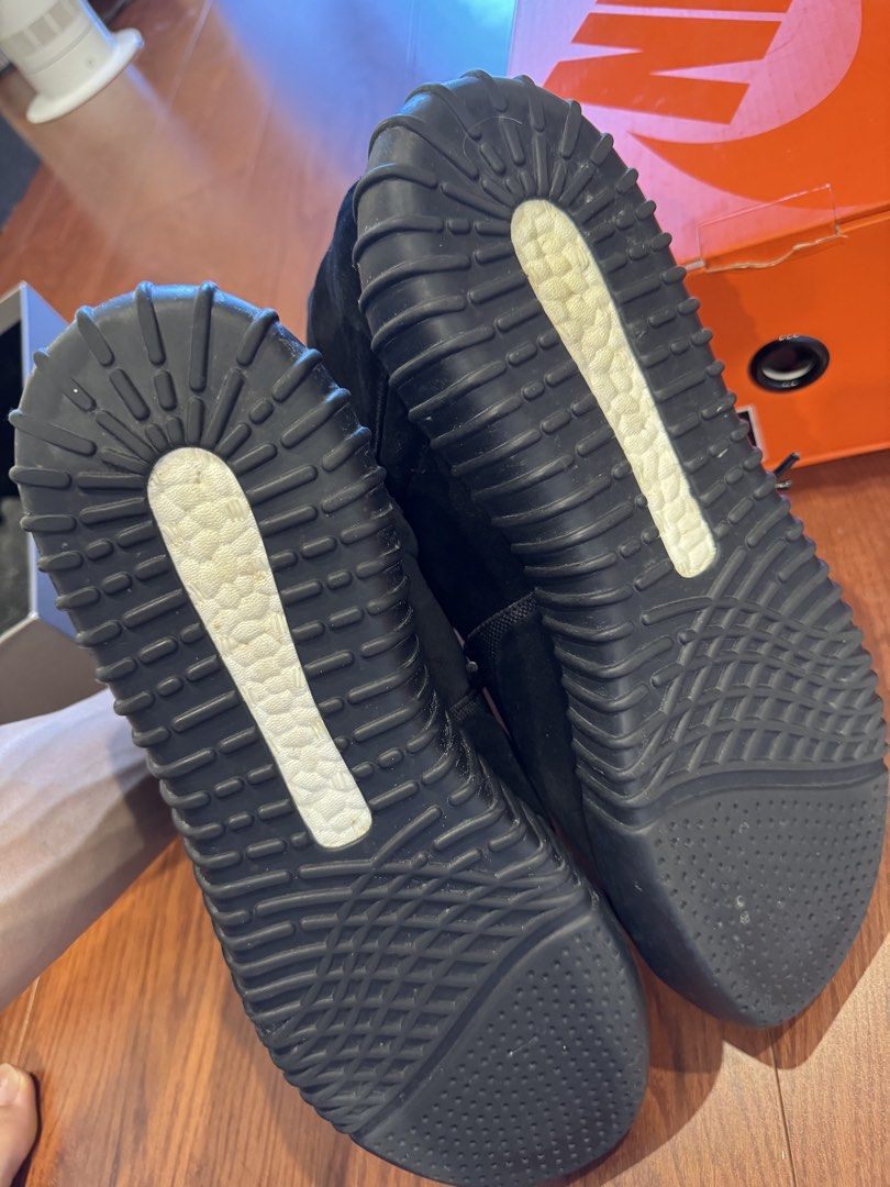 Adidas Yeezy Boost 750 Black Suede High Top Sneakers (Category: Sneakers) located in Singapore. Submitted by 9piter (Listing ID 1444390891, Image 3). Description: - Adidas Yeezy Boost 750 - Color: Black Suede - Size: US 12 - Design: High top with side zipper and ankle strap - Sole: Gum sole with Boost cushioning - Includes: Original box and Farfetch tag -StockX USD1k ++.