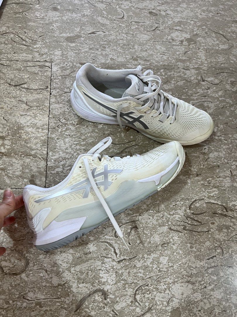 ASICS Gel Resolution 9 Tennis Shoes (Category: Sneakers) located in Singapore. Submitted by redtomato (Listing ID 1444314968, Image 1). Description: Gel resolution 9 -White pure silver - Size: US 9.5 - Wide type - Extremely under utilized -Pick up at Holland V.