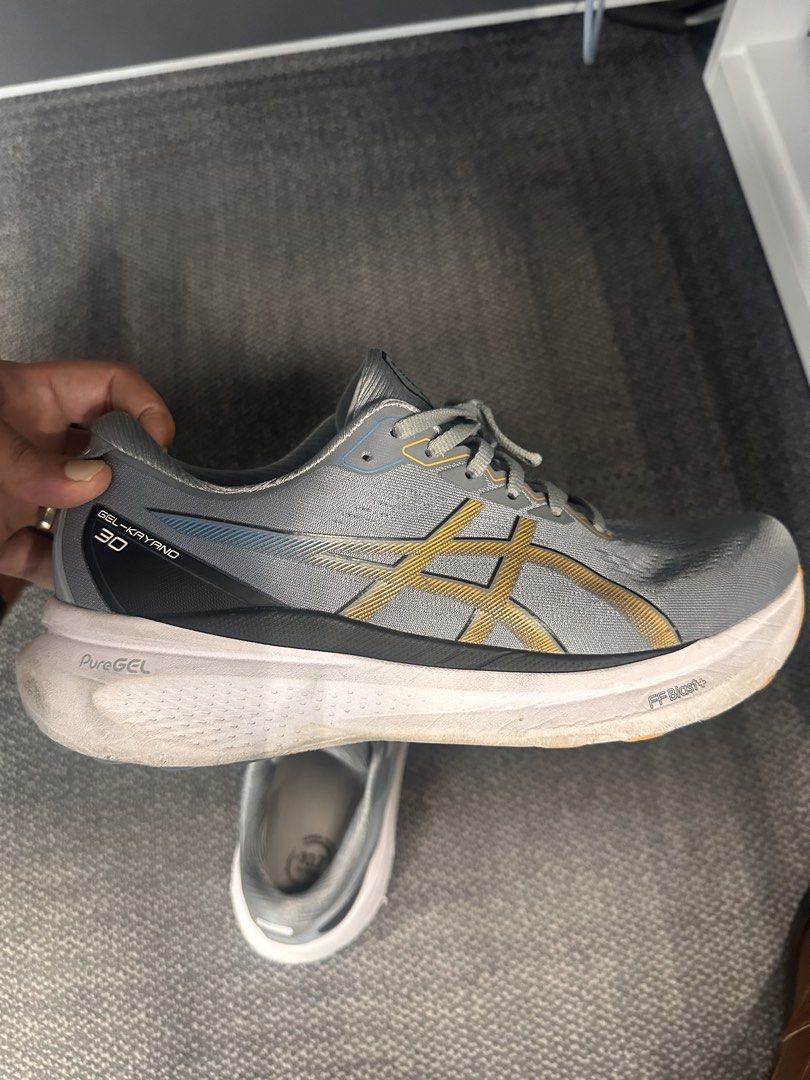 ASICS Gel-Kayano 30 Running Shoes UK 11 (Category: Sneakers) located in Singapore. Submitted by jeta444 (Listing ID 1444332978, Image 3). Description: - ASICS Gel-Kayano 30 Running Shoes - Colour: Grey with Gold Accents - Size: Men's UK 11 - Versatile: Suitable for running and everyday wear - Reason for Selling: decluttering .