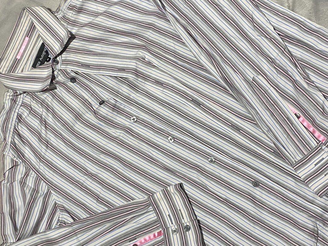 Autograph Striped Long Sleeve Shirt (Category: Tshirts & Polo Shirts ) located in Cavite. Submitted by lana_quinn (Listing ID 1444356729, Image 2). Description: - Classic striped long sleeve shirt from Autograph. - Features a mix of grey, white, blue, and maroon stripes. - Button-up front with a collar. - Subtle pink accent on the inner cuffs. - Size: Medium (M). - Perfect for versatile casual or smart-casual outfits..