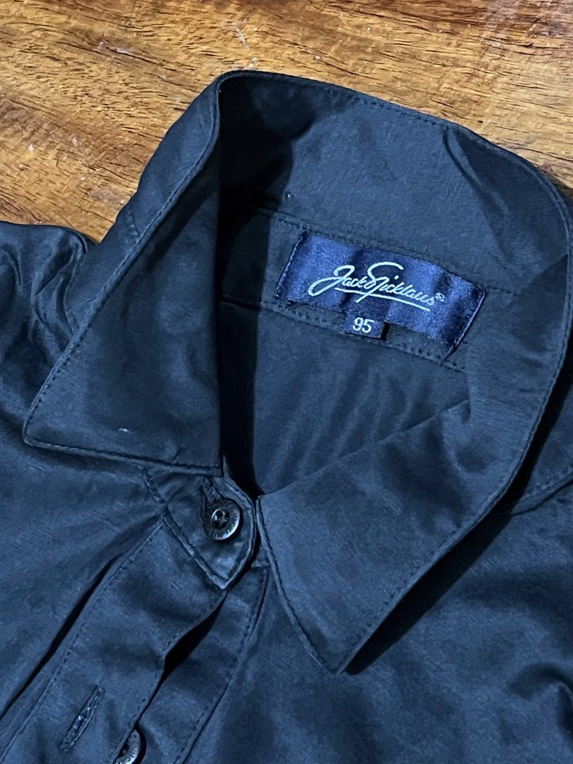 Black Long Sleeve Polo Shirt Size (Category: Coats, Jackets and Outerwear) located in Leyte. Submitted by jcatle (Listing ID 1444367355, Image 3). Description: - Brand: Jack Nicklaus - Color: Black - Style: Long-sleeved polo shirt - Size: 95 - Features: Small embroidered bear logo on chest, button-up neckline - Perfect for: Casual wear or golf.