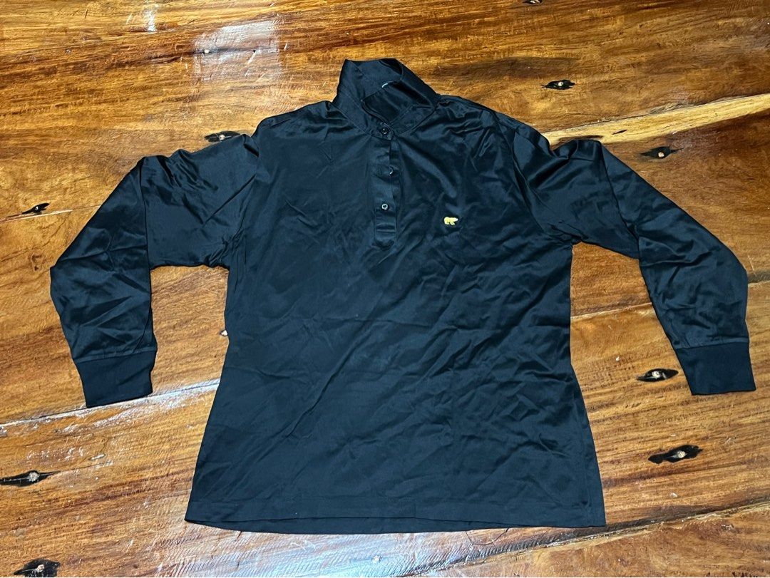 Black Long Sleeve Polo Shirt Size (Category: Coats, Jackets and Outerwear) located in Leyte. Submitted by jcatle (Listing ID 1444367355, Image 1). Description: - Brand: Jack Nicklaus - Color: Black - Style: Long-sleeved polo shirt - Size: 95 - Features: Small embroidered bear logo on chest, button-up neckline - Perfect for: Casual wear or golf.