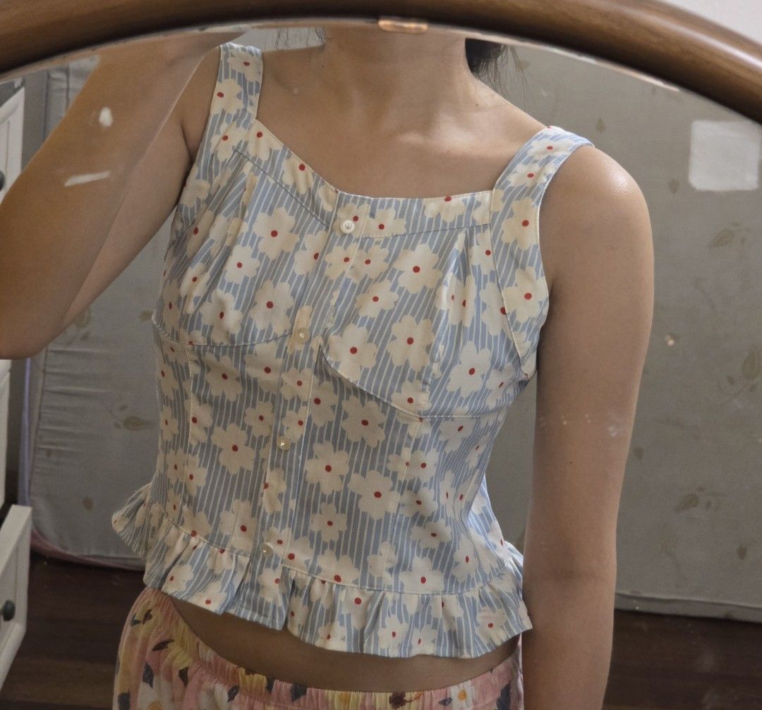 Blue Striped Floral Ruffle Hem Crop Top (Category: Others Tops) located in Manila. Submitted by yzahmae (Listing ID 1444420344, Image 3). Description: small to medium size.