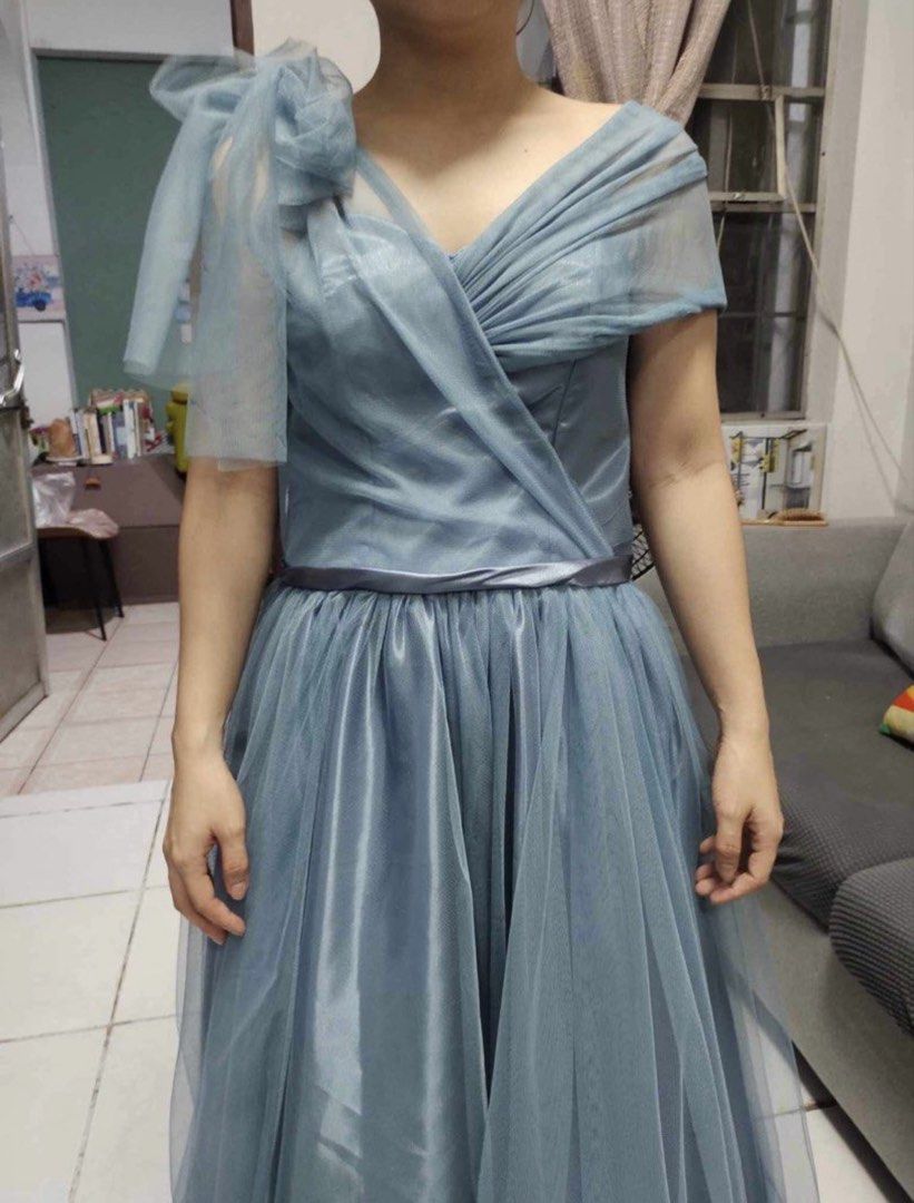 Blue Tulle One-Shoulder Formal Gown (Category: Evening dresses & gowns) located in Quezon City. Submitted by lavl00 (Listing ID 1444434806, Image 2). Description: - Beautiful blue tulle gown - Elegant one-shoulder design with draped detailing - Adjustable lace-up back closure - Floor-length with a flowing skirt - Ideal for formal events or as a bridesmaid dress - Worn only once for a wedding.