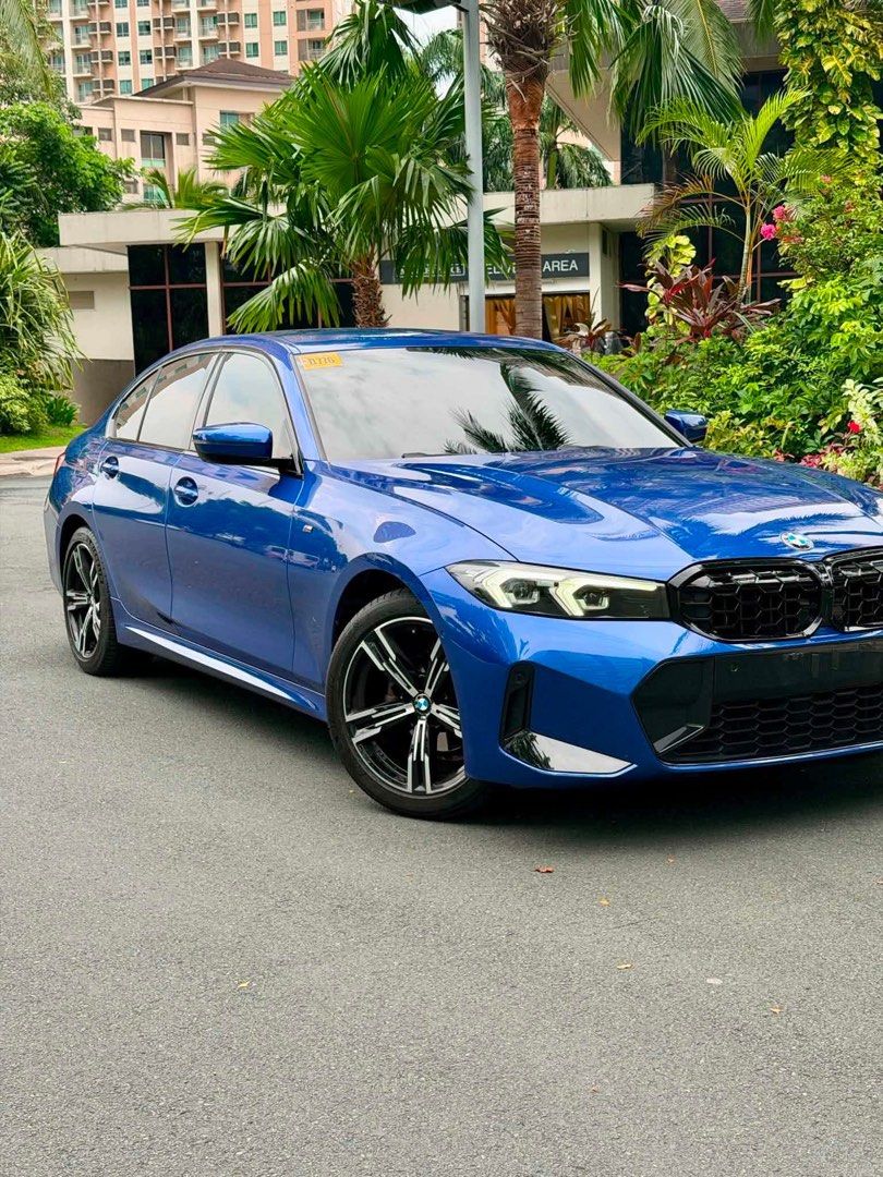 BMW 318i MSport Auto (Category: Used Cars) located in Manila. Submitted by quality_cars (Listing ID 1444483748, Image 2). Description: FOR SALE‼️ 2024 BMW 318i M sport Only 1 in the market BMW blue metallic Low mileage Very pristine condition First owner acquired BMW casa maintained Installed with PPF upon release from casa 90% threadlife tires Original M sport mags Original M sport badges Original M sport exhaust tip Installed with rear spoiler 