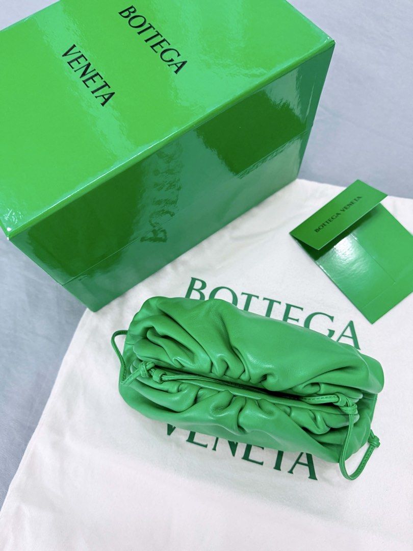 Bottega Veneta mini pouch (Category: Luxury Bags & Wallets) located in Makati City. Submitted by nmvs1 (Listing ID 1444430798, Image 2). Description: Authentic Bottega Veneta pouch bag Color: parakeetGreen - Includes: Dust bag, box, authenticity card With sling crossbody or as a pouch Super great condition.
