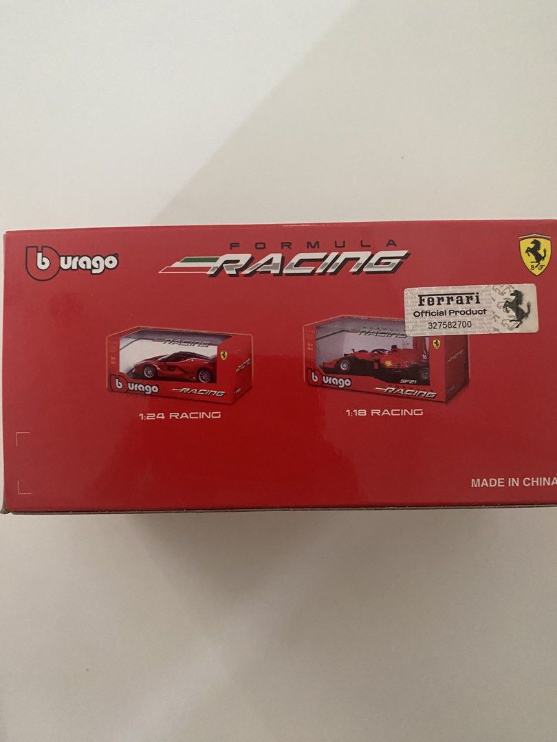 Burago Ferrari F1-75 Formula 1 Model (Category: Vehicle & Diecast Models) located in Pasay City. Submitted by leugel (Listing ID 1444368118, Image 2). Description: - Burago 1:43 scale model - Ferrari F1-75 Formula 1 car - Classic red with Santander livery - Still in original packaging - Can send more pictures - For collectors.