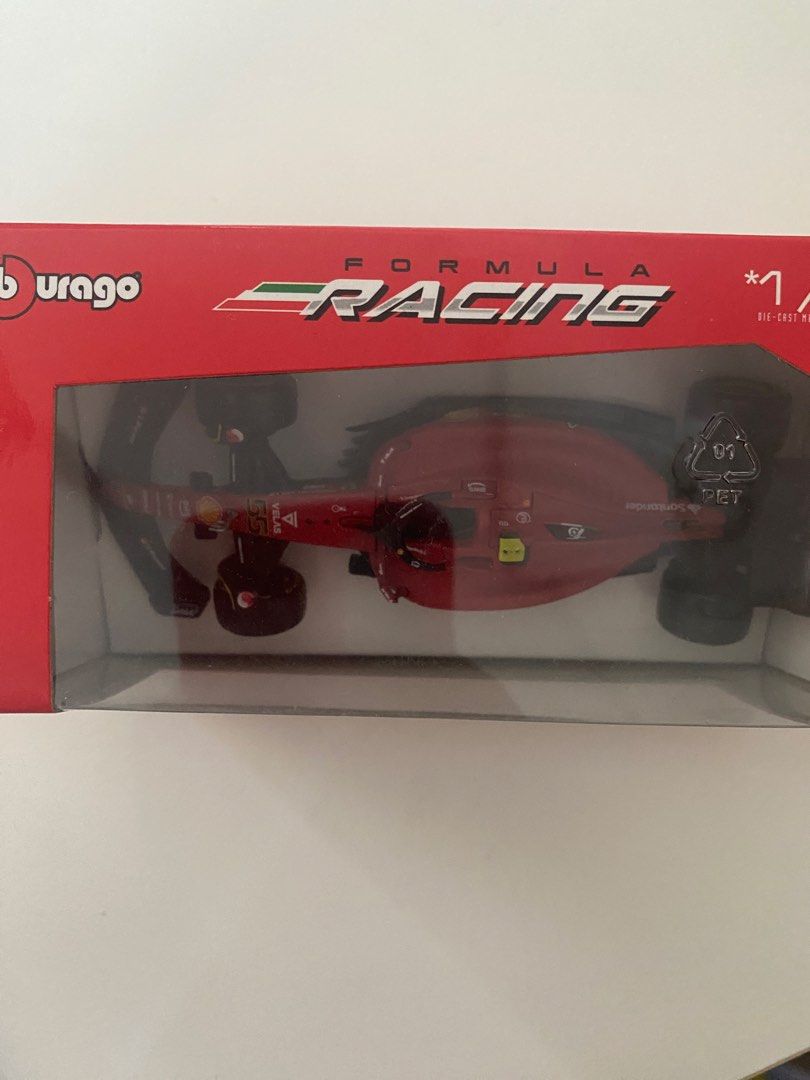 Burago Ferrari F1-75 Formula 1 Model (Category: Vehicle & Diecast Models) located in Pasay City. Submitted by leugel (Listing ID 1444368118, Image 3). Description: - Burago 1:43 scale model - Ferrari F1-75 Formula 1 car - Classic red with Santander livery - Still in original packaging - Can send more pictures - For collectors.