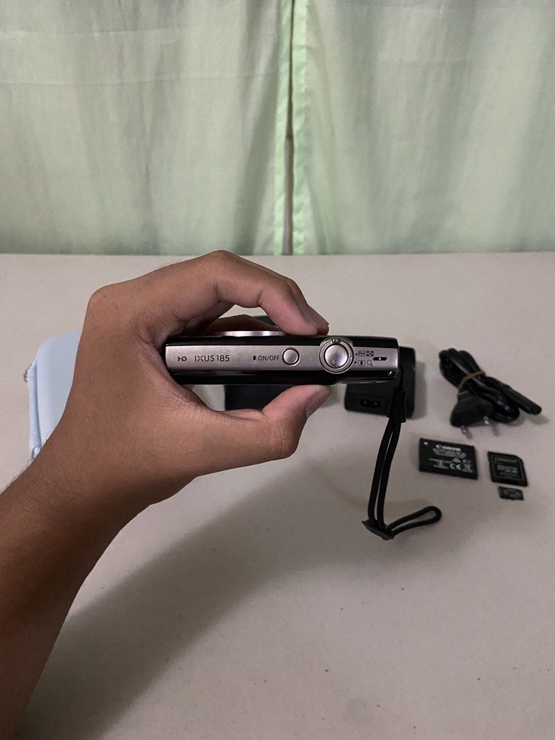Canon IXUS 185 Digicam (Category: Cameras) located in Pasay City. Submitted by andreiisasundae (Listing ID 1432621124, Image 3). Description: Canon IXUS 185/PowerShot ELPH 185/IXY 200 Black Digicam Quick Specs: - 20 MP Sensor - Digic 4+ Processor - 8x Optical Zoom Lens Inclusions: - Original Canon Camera Case - Original Canon Battery Charger - XBYS Camera Case - Kingston MicroSD Card to SD Card Adaptor - Kingston 32gb MicroSD Card The last 4 pict