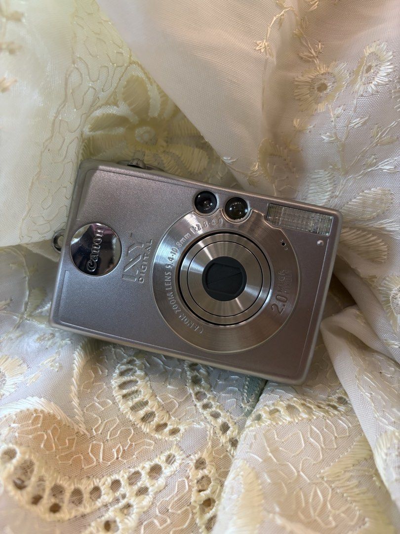 Canon IXY DIGITAL 2.0 Megapixels Camera (Category: Cameras) located in Davao. Submitted by pixelsbyenna (Listing ID 1444460524, Image 2). Description: Body: 8.5/10 Output: No issue Bought in Japan - Silver Canon IXY DIGITAL camera - 2.0 Megapixel resolution - 34-102mm lens (f/2.8-4.9) - Back screen and control buttons - CF card slot for storage - Ideal for casual photography Shoulder the Delivery Fee.