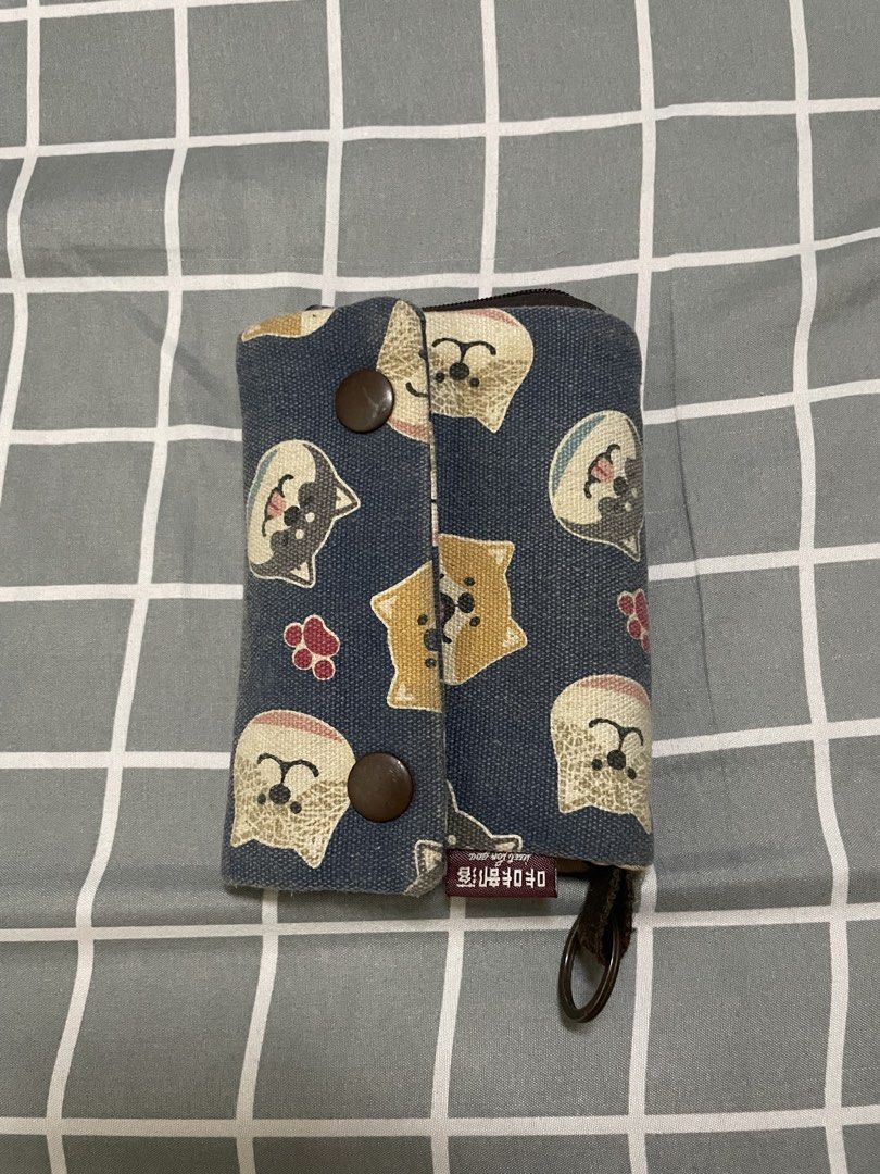 Canvas Dog Print Wallet (Category: Wallets & Card holders) located in Quezon City. Submitted by murmae (Listing ID 1444361781, Image 1). Description: - Durable canvas material with a charming dog print design. - Secure snap button closure - Features multiple compartments - Includes a zippered pocket for coins and a section for cards - Have multiple card holder - Compact and stylish, perfect for everyday use MOP Maribank, Gotyme or Gcash (payment 