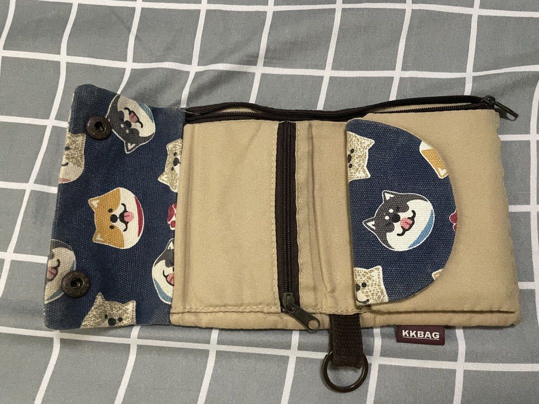 Canvas Dog Print Wallet (Category: Wallets & Card holders) located in Quezon City. Submitted by murmae (Listing ID 1444361781, Image 2). Description: - Durable canvas material with a charming dog print design. - Secure snap button closure - Features multiple compartments - Includes a zippered pocket for coins and a section for cards - Have multiple card holder - Compact and stylish, perfect for everyday use MOP Maribank, Gotyme or Gcash (payment 
