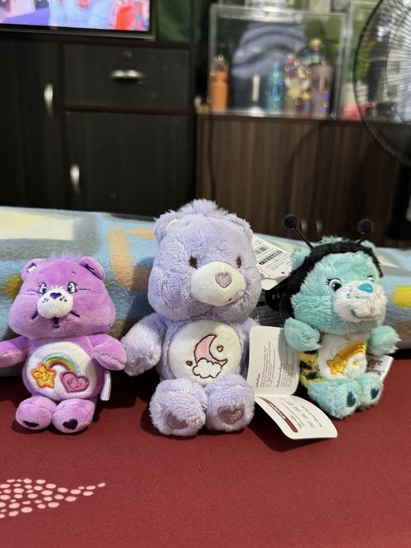 Care Bears Plush Toys - Funshine Bear, Dream Bright Bear, Grumpy Bear (Category: Plushies & Soft Toys) located in Bulacan. Submitted by elihoh (Listing ID 1444407925, Image 2). Description: - Set of 3 adorable Care Bears plush toys. - Includes Funshine Bear with rainbow and star design. - Features Dream Bright Bear with moon and cloud design. - Comes with a cute bee-themed Care Bear. - All plush toys have their original tags attached. - Ideal for