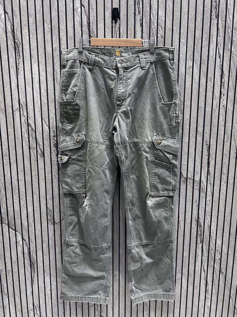 Carhartt Double Knee Cargo Moss Green (Category: Jeans) located in Malasiqui. Submitted by blckfourthrift (Listing ID 1444368122, Image 1). Description: Carhartt Double Knee Cargo Moss Green Relaxed Fit Waist: 34 Length: 42 Leg Opening: 8.5 Issue/s: Holes,Paint stains ,Tattering & Fade .
