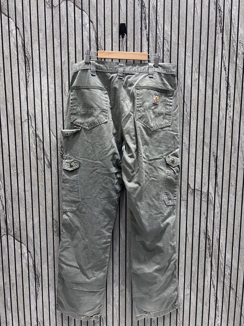 Carhartt Double Knee Cargo Moss Green (Category: Jeans) located in Malasiqui. Submitted by blckfourthrift (Listing ID 1444368122, Image 2). Description: Carhartt Double Knee Cargo Moss Green Relaxed Fit Waist: 34 Length: 42 Leg Opening: 8.5 Issue/s: Holes,Paint stains ,Tattering & Fade .