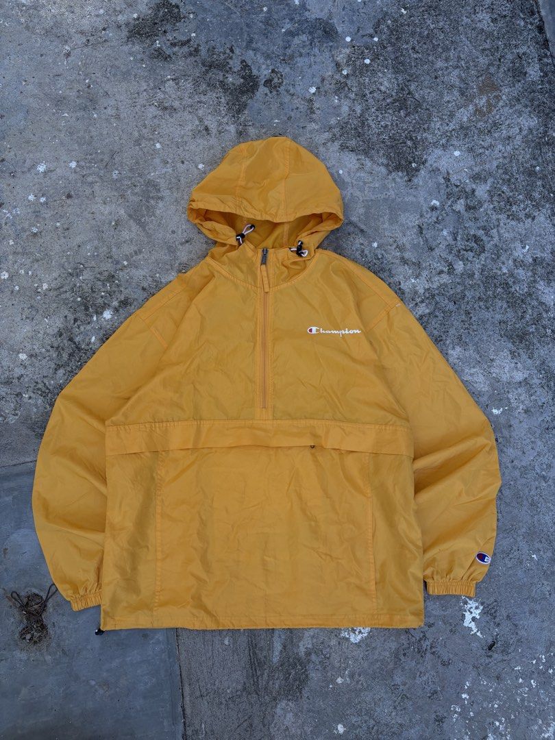 Champion Yellow Anorak Windbreaker Jacket (Category: Coats, Jackets and Outerwear) located in Consolacion. Submitted by hardy_303 (Listing ID 1444380588, Image 1). Description: - Yellow Champion anorak jacket - Hooded with a half-zip closure - Front kangaroo pocket with an additional zip pocket - Elastic cuffs and hem for a snug fit - Small Champion logo details on chest and sleeve - Ideal for layering or protection against light rain.