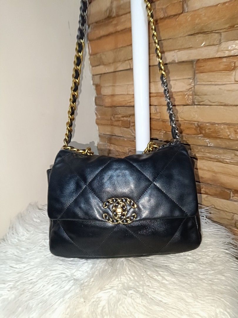 Chanel 19 Black Leather Flap Bag with code (Category: Luxury Bags & Wallets) located in Antipolo. Submitted by secondmusebags (Listing ID 1444484260, Image 1). Description: Negotiable Condition: Good as new Code has tear - with code - Black leather flap bag - Diamond quilting detail - Gold and silver chain strap - Iconic Chanel logo on front closure - Spacious interior - Perfect for day or night use.