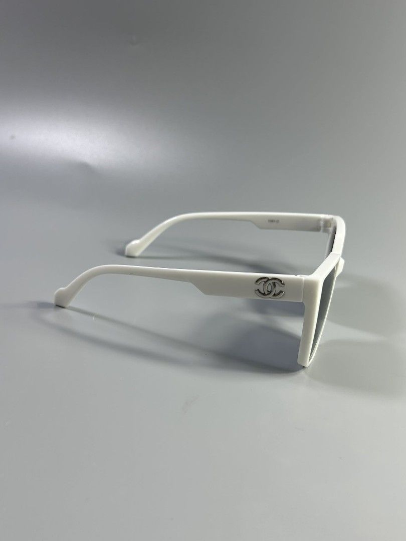 Chanel Sunglasses (Category: Luxury Accessories) located in Bacolod City. Submitted by luxtrend.ph (Listing ID 1444312465, Image 3). Description: ✨👓Chanel Sunglasses👓✨ •For Women •Pristine condition •No flaws Core Features •Frame Style: Bold, full-rimmed geometric square design, In a white/ivory acetate. •Colorway: Crisp white frame paired with solid black/dark grey lenses. •Signature Details: Metallic interlocking CC accents embedded directly 