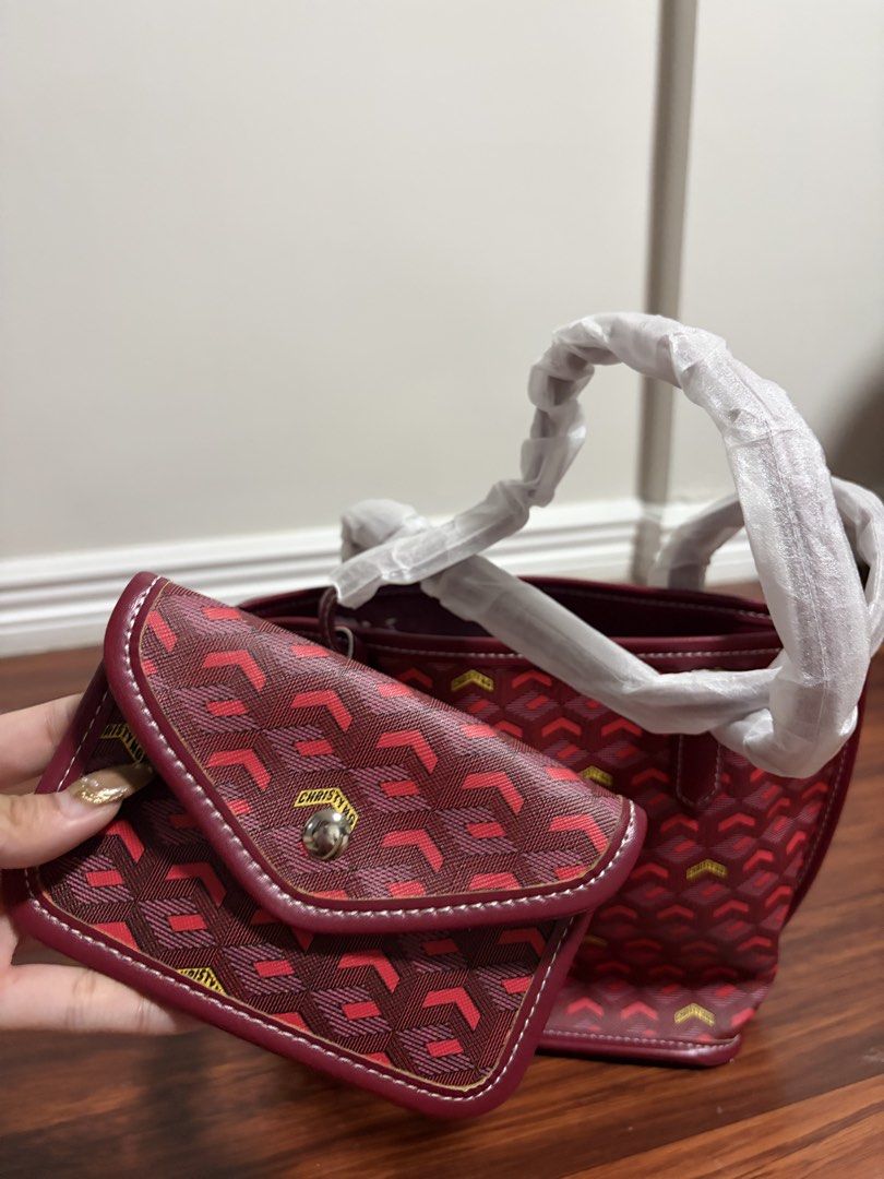Christy Ng Red Monogram Tote Bag with Pouch (Category: Tote Bags) located in Valenzuela. Submitted by pencakes_ (Listing ID 1444434502, Image 2). Description: red mini tote bag from christy ng comes with a matching pouch includes a horse shoe charm gifted to me, never been used rfs - decluttering shipping fee will be shouldered by the buyer:).