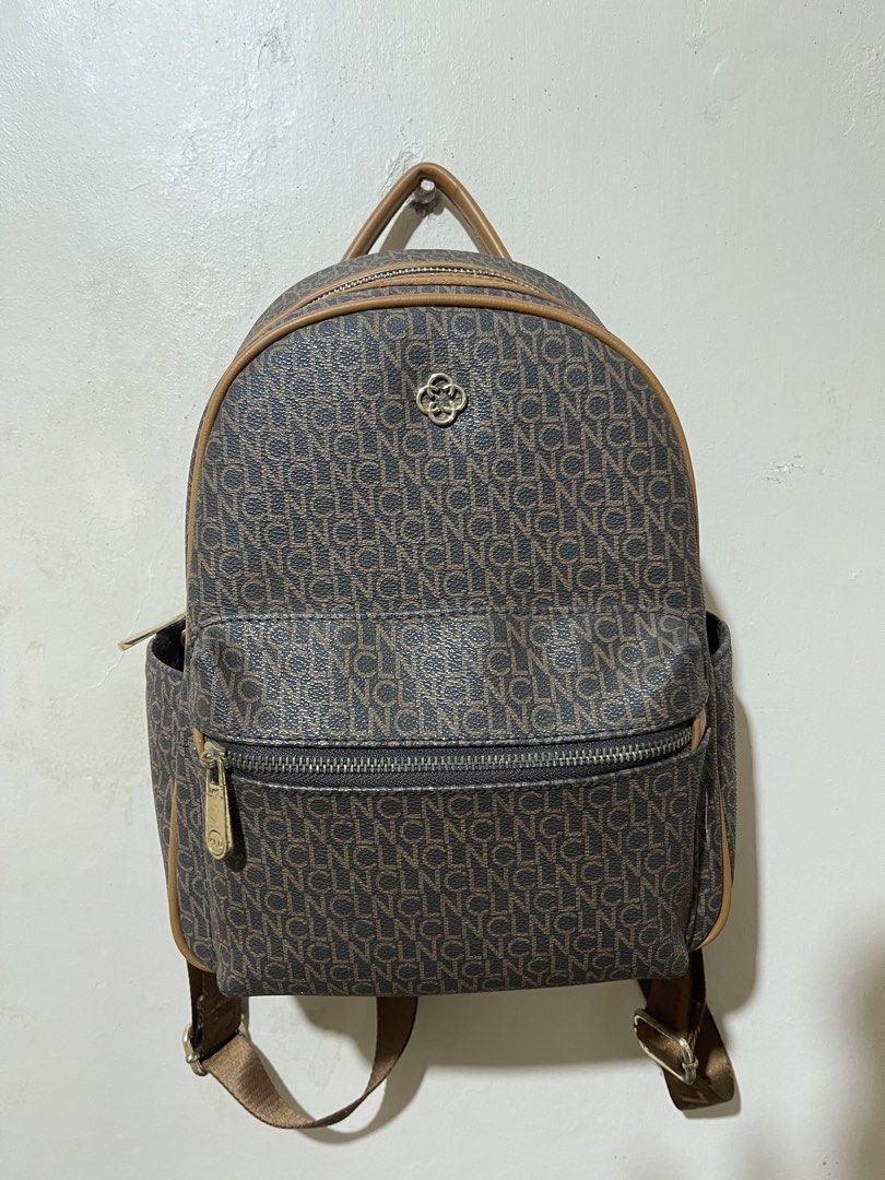 CLN Signature Monogram Backpack (Category: Backpacks) located in Meycauayan. Submitted by shiz_wihz (Listing ID 1444325793, Image 1). Description: Selling my preloved Authentic CLN Monogram Mini Backpack in color Brown - in very good used condition! - no scratches sa mismong leather - with compartments in front, inside and at the back of the bag Selling Price: 1,900 pesos Via Lalamove or J&T delivery (buyer will shoulder the fee) .
