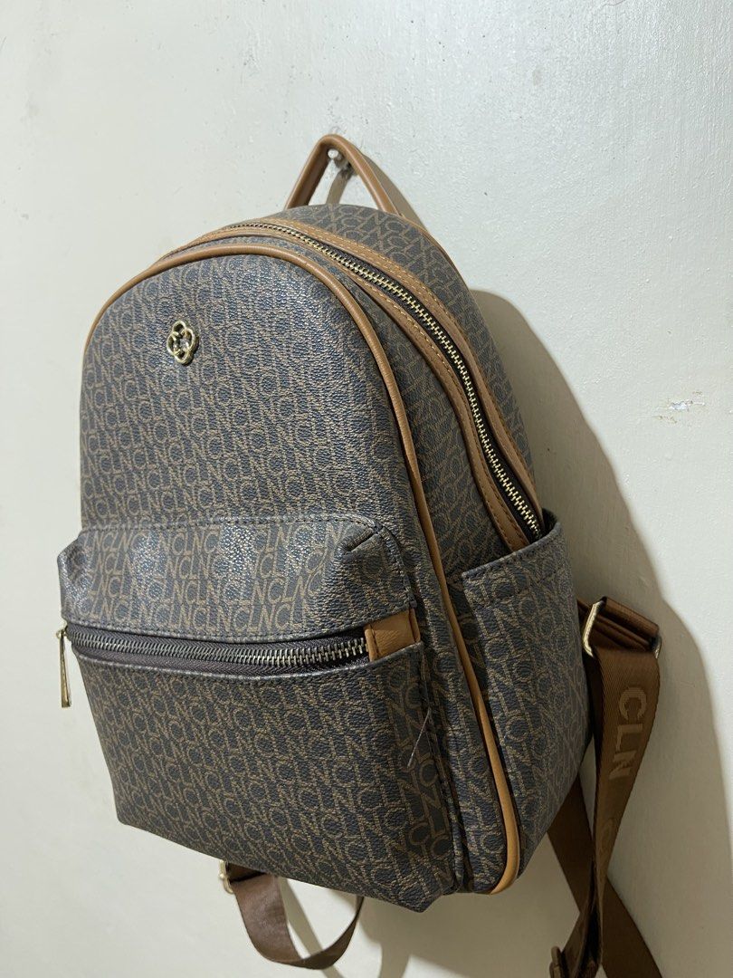CLN Signature Monogram Backpack (Category: Backpacks) located in Meycauayan. Submitted by shiz_wihz (Listing ID 1444325793, Image 2). Description: Selling my preloved Authentic CLN Monogram Mini Backpack in color Brown - in very good used condition! - no scratches sa mismong leather - with compartments in front, inside and at the back of the bag Selling Price: 1,900 pesos Via Lalamove or J&T delivery (buyer will shoulder the fee) .