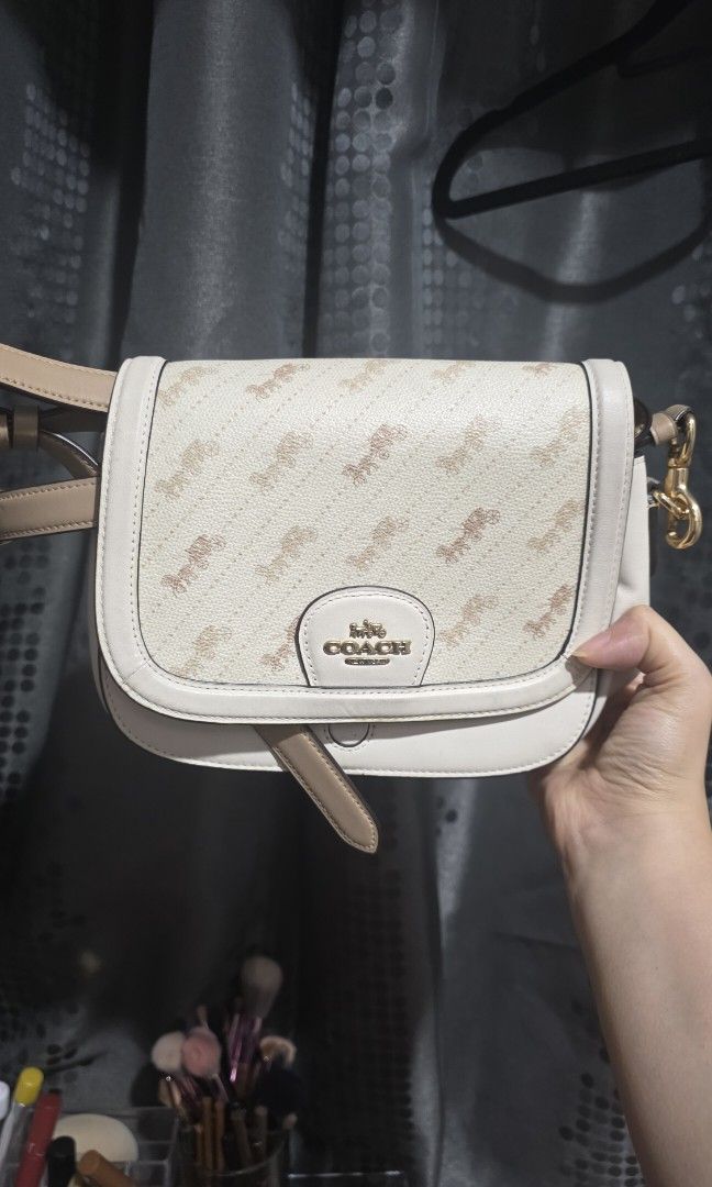 Coach saddle bag (Category: Luxury Bags & Wallets) located in Manila. Submitted by declutterforbtsticket (Listing ID 1444475001, Image 1). Description: .