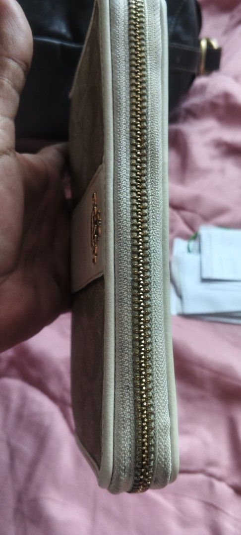 Coach Signature Zip Around Wallet (Category: Wallets & Card holders) located in Dasmarinas. Submitted by MVB0505 (Listing ID 1444335989, Image 1). Description: - Coach Zip Around Wallet - Signature C pattern in tan and cream...CLEAN INSIDE AND OUT bought in japan...malinis parang bago.