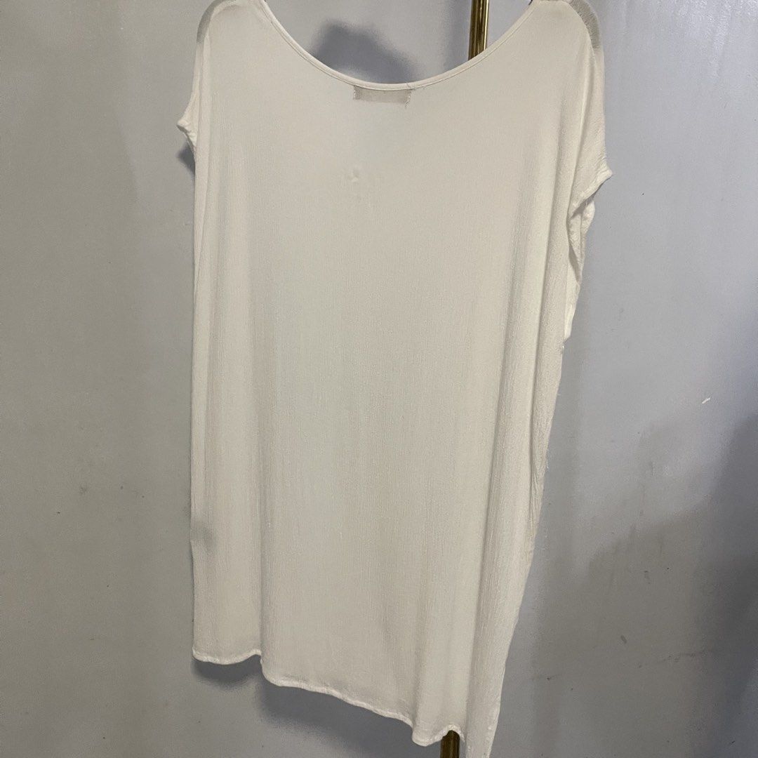 Coco Cabana White Eyelet Tassel Tunic Top Size M (Category: Others Tops) located in General Trias. Submitted by 1992thelabel (Listing ID 1444396224, Image 3). Description: Selling to feed more bellies 🐾 Proceeds go to my rescue dogs, cats & strays. Please respect the price, no much haggling. Thank you 🫶🏻 - Brand: COCO CABANA - Color: White - Style: Tunic Top - Size: Medium (M) - Details: Intricate eyelet embroidery down the front, tassel tie a