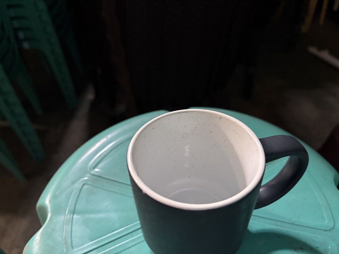 Dark Grey Mug with Speckled Interior matt finished (Category: Coffee & Tea Tableware) located in Quezon City. Submitted by cynlchan (Listing ID 1444338503, Image 2). Description: - Simple dark grey mug - Speckled pattern inside - Ideal for coffee or tea - Sturdy handle for a comfortable grip - Approximately 8 to 9 oz - Great for everyday use.