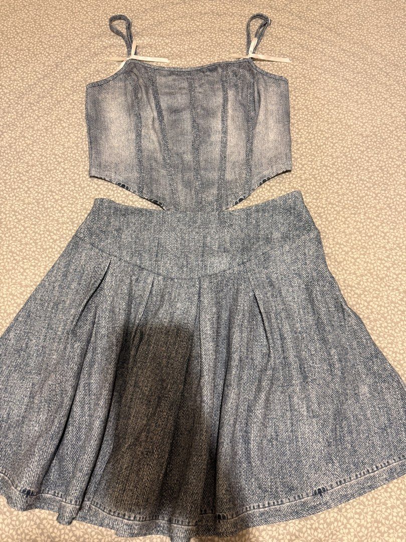 Denim Corset Cutout Mini Dress (Category: Dresses) located in Cebu City. Submitted by btsandmore (Listing ID 1444438156, Image 1). Description: - Cute denim mini dress - Corset top with waist cutout detail - Flattering pleated skirt - Adjustable spaghetti straps - Versatile for night outs or casual days.