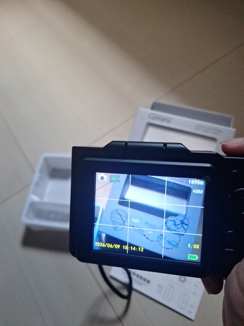 Digital Camera (Category: Cameras) located in Singapore. Submitted by foundatmine (Listing ID 1444374975, Image 3). Description: - Compact digital camera - Built-in LED ring light for perfect selfies, High resolution: 48.0 megapixels - Screen flips out for easy viewing - Good for kids as a starter camera / casual photography - Includes USB charging cable, transferring, manual and a pouch. Meetup: Tanah Merah MRT Mailing +$3 (do lmk as may not be 